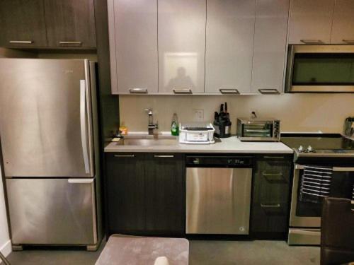 Furnished 1 Bedroom In East Village By Signature Suites Ltd YYC Kültér fotó
